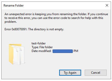 captura de pantalla del mensaje de error cuando se intenta cambiar el nombre de una carpeta que no está vacía