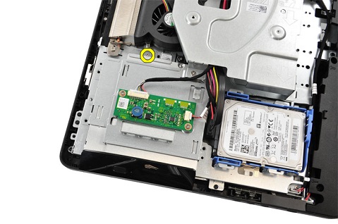 Removing the screw from the rear of the optical drive