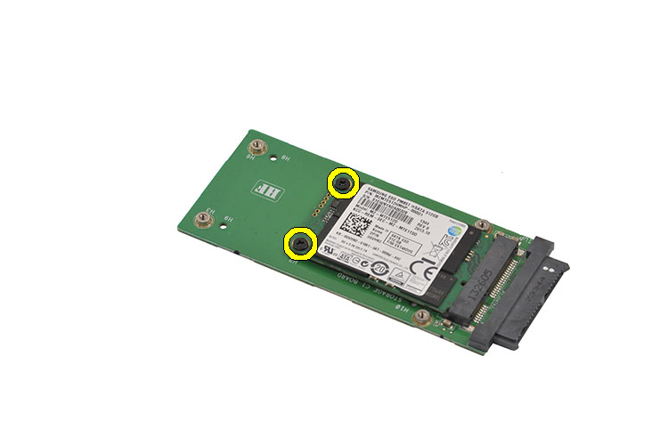 Removing the screws holding the mSATA hard drive to the mSATA board