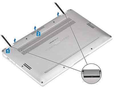 Za pomocą rysika z tworzywa sztucznego oddziel dolną pokrywę