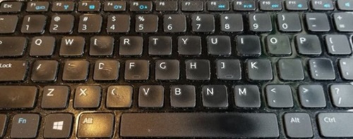 Dell-computer, slidte eller skinnende taster