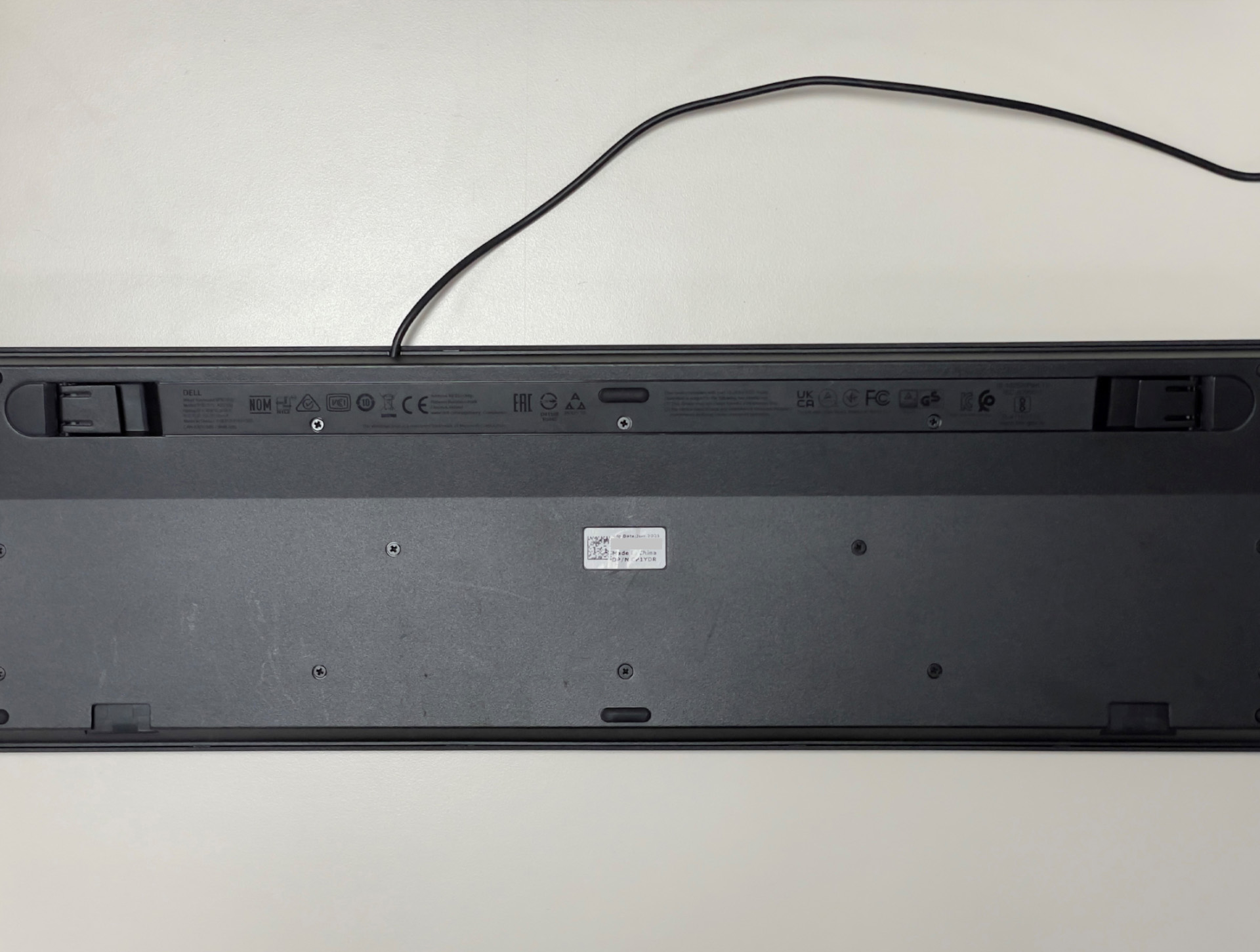 PPID ou numéro de série d’un clavier Dell sur le panneau inférieur