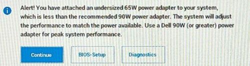 65W power adaptor attached