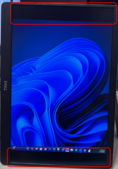 Přenosný monitor Dell Pro 14 Plus P1425 s černými pruhy nahoře a dole v režimu na výšku