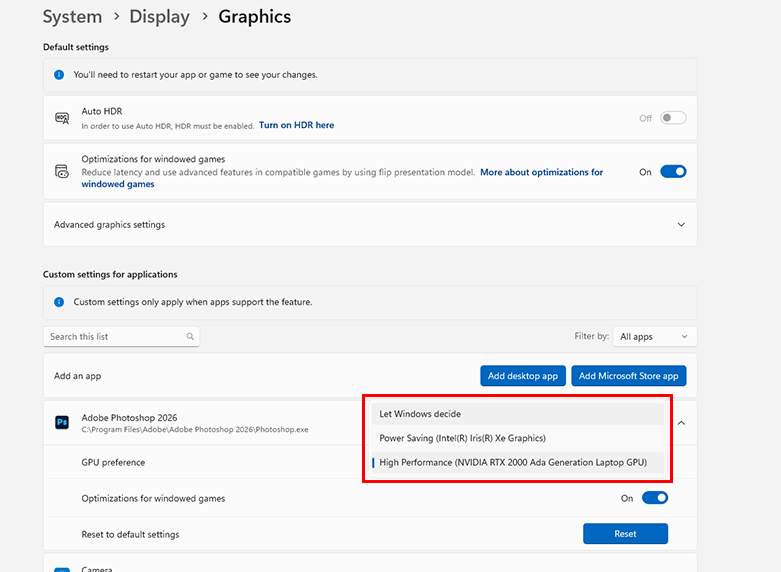 Screenshot of a computer graphics settings panel showing options for managing GPU preferences for Adobe Photoshop 2026. The highlighted section displays three GPU preference choices: Let Windows decide, Power Saving (Intel(R) Iris(R) Xe Graphics), and High Performance (NVIDIA RTX 2000 Ada Generation Laptop GPU), with High Performance selected.