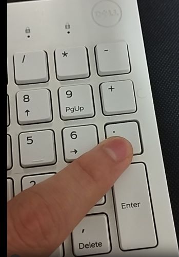 Touche de point sur le pavé numérique